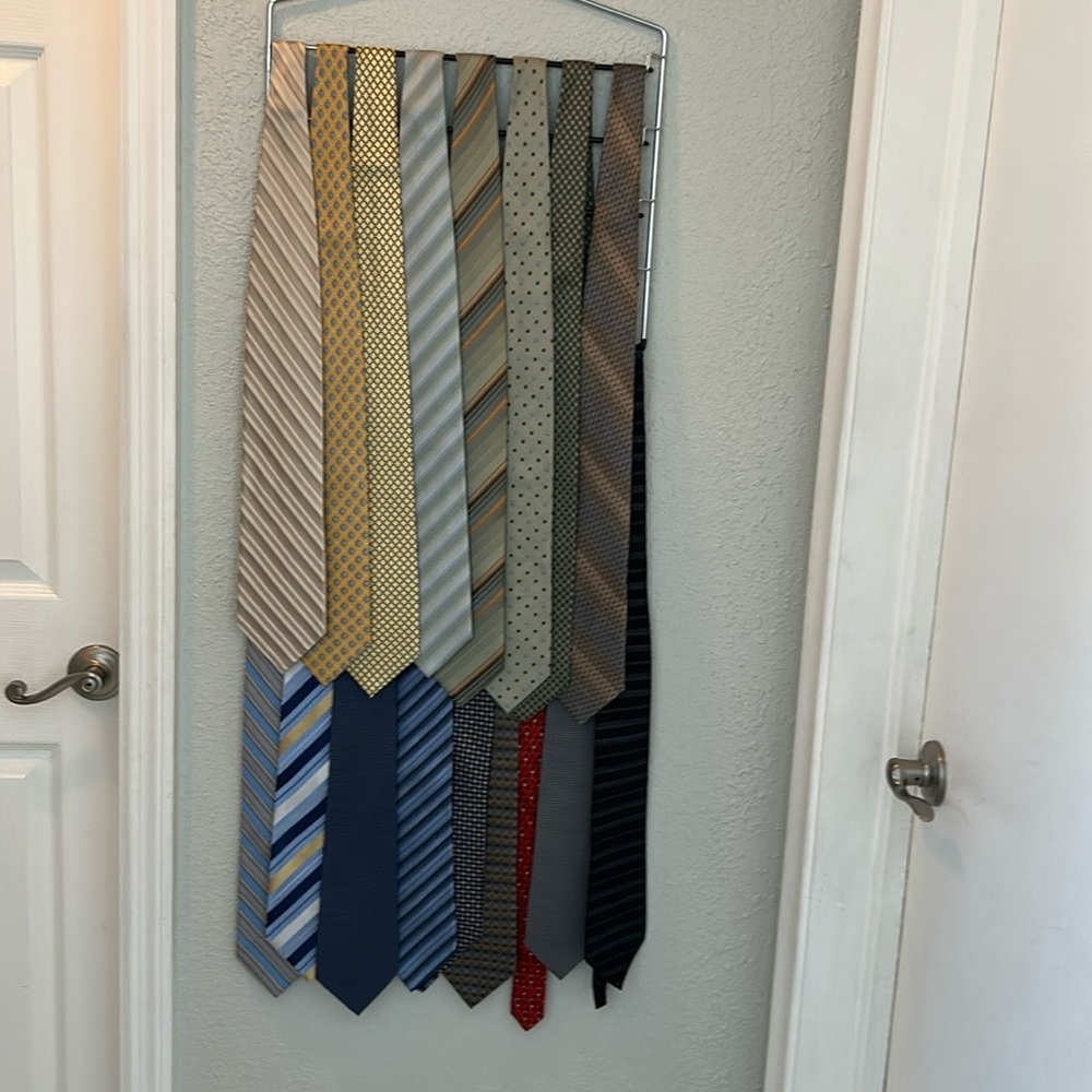 17 Men’s Ties in assorted colors and brands like DKNY and Calvin Klein.